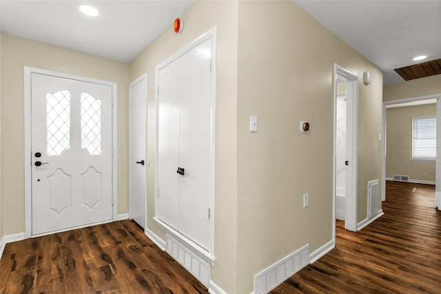 2302 Mockingbird Ln, Garland, TX 75042 - entrance foyer featuring dark wood-type flooring, baseboards, and recessed lighting