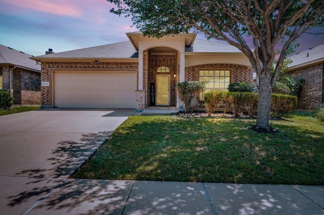 6620 Friendsway Dr, Fort Worth, TX 76137 - view of front of house with brick siding, an attached garage, a lawn, and driveway