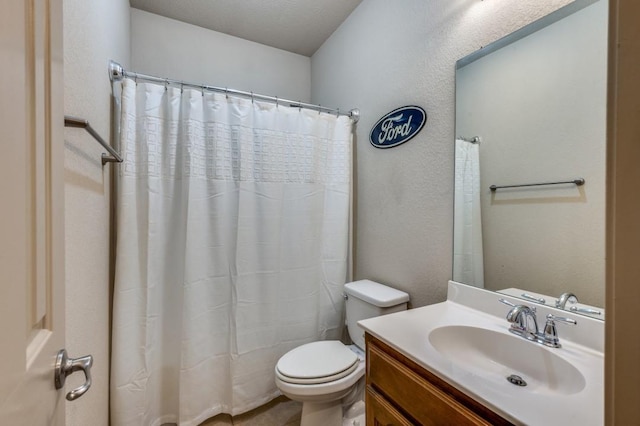 6620 Friendsway Dr, Fort Worth, TX 76137 - bathroom featuring toilet, vanity, curtained shower, and a textured wall