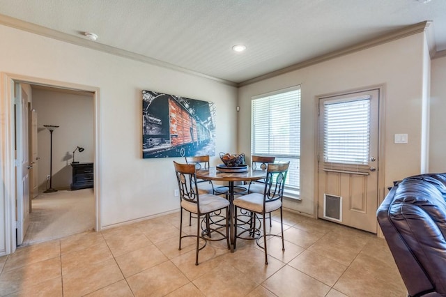 6620 Friendsway Dr, Fort Worth, TX 76137 - dining room with crown molding, light tile patterned floors, baseboards, and recessed lighting