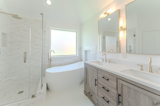 2025 Scott Creek Dr, Little Elm, TX 75068 - full bath with a marble finish shower, a soaking tub, and double vanity