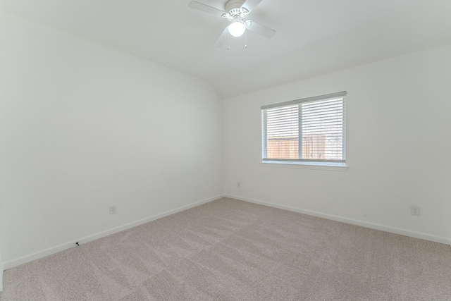 2025 Scott Creek Dr, Little Elm, TX 75068 - empty room with light carpet, vaulted ceiling, baseboards, and a ceiling fan