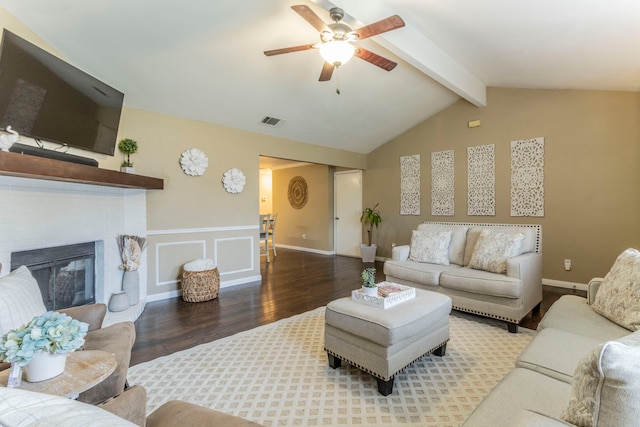 8713 Trinity Vista Trl, Fort Worth, TX 76053 - living room with wood finished floors, a ceiling fan, a brick fireplace, and wainscoting