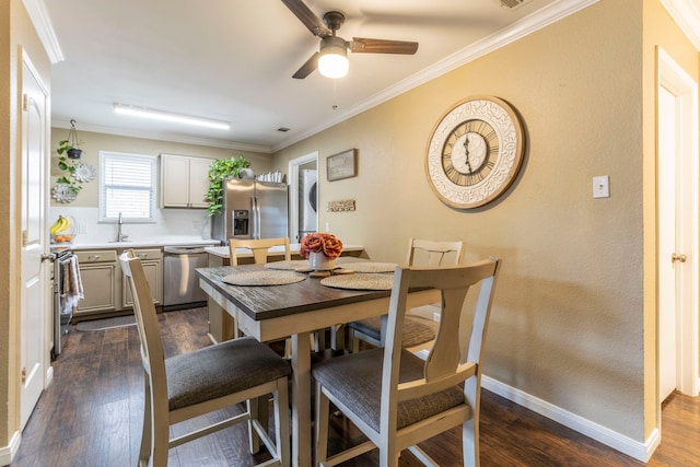 8713 Trinity Vista Trl, Fort Worth, TX 76053 - dining space featuring a ceiling fan, ornamental molding, and dark wood-style flooring