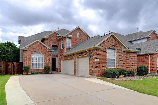 3112 Myrtice Dr, Flower Mound, TX 75022 - traditional-style house with driveway, brick siding, roof with shingles, and a garage
