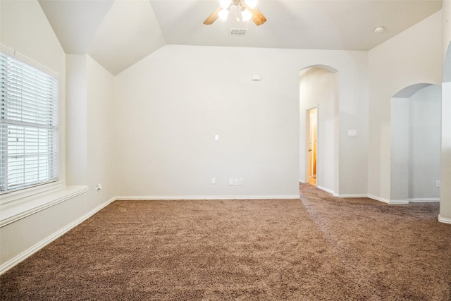 3112 Myrtice Dr, Flower Mound, TX 75022 - carpeted empty room featuring arched walkways, ceiling fan, lofted ceiling, and baseboards