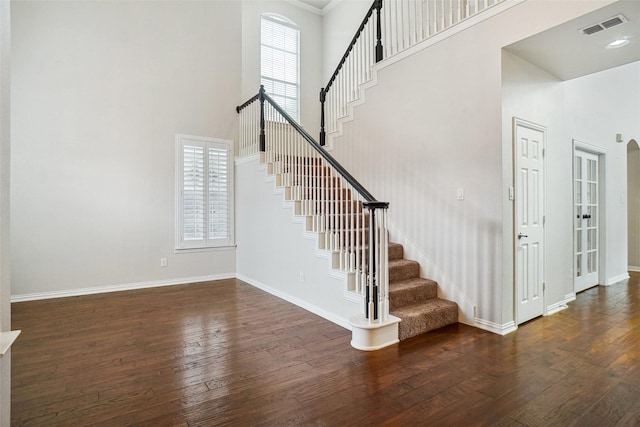 3112 Myrtice Dr, Flower Mound, TX 75022 - stairs with a high ceiling, wood finished floors, and baseboards