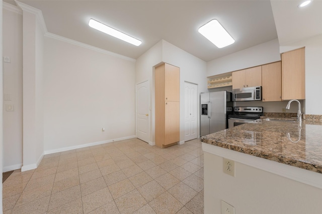 3225 Turtle Creek Blvd Unit 1012, Dallas, TX 75219 - kitchen with appliances with stainless steel finishes, light brown cabinetry, a sink, baseboards, and crown molding