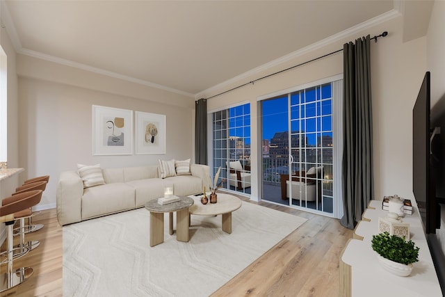 3225 Turtle Creek Blvd Unit 1012, Dallas, TX 75219 - living room featuring light wood finished floors and crown molding