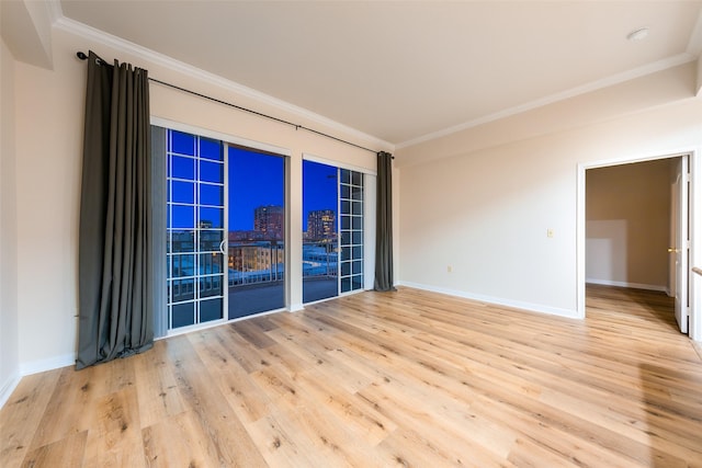 3225 Turtle Creek Blvd Unit 1012, Dallas, TX 75219 - empty room with light wood-type flooring, crown molding, and baseboards