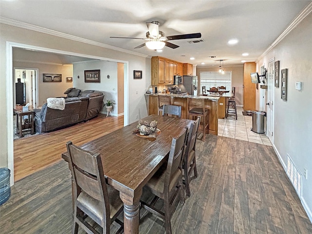 434 Thornton Ln, Palo Pinto, TX 76484 - dining room featuring light wood finished floors, crown molding, a ceiling fan, baseboards, and recessed lighting