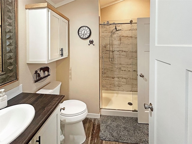 434 Thornton Ln, Palo Pinto, TX 76484 - bathroom with a shower stall, toilet, vanity, baseboards, and wood finished floors