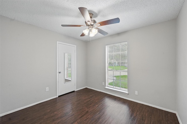 815 Quail Ter, Mansfield, TX 76063 - spare room featuring wood finished floors, baseboards, ceiling fan, and a textured ceiling