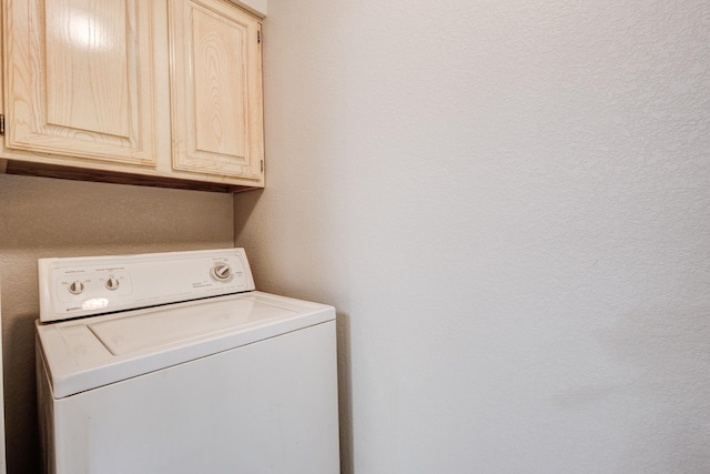 1019 W Lovers Ln W, Arlington, TX 76013 - washroom featuring washer / dryer and cabinet space
