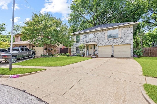 1019 W Lovers Ln W, Arlington, TX 76013 - view of front of property featuring driveway, a garage, and brick siding