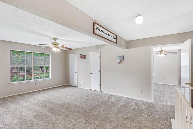 1019 W Lovers Ln W, Arlington, TX 76013 - carpeted spare room featuring ceiling fan and a textured ceiling