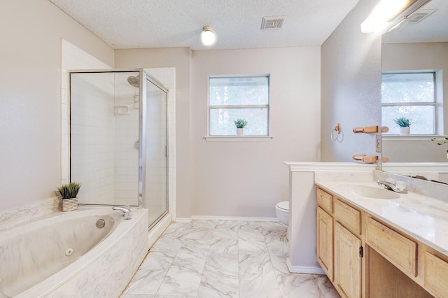 1019 W Lovers Ln W, Arlington, TX 76013 - full bathroom with a stall shower, plenty of natural light, vanity, a tub with jets, and a textured ceiling