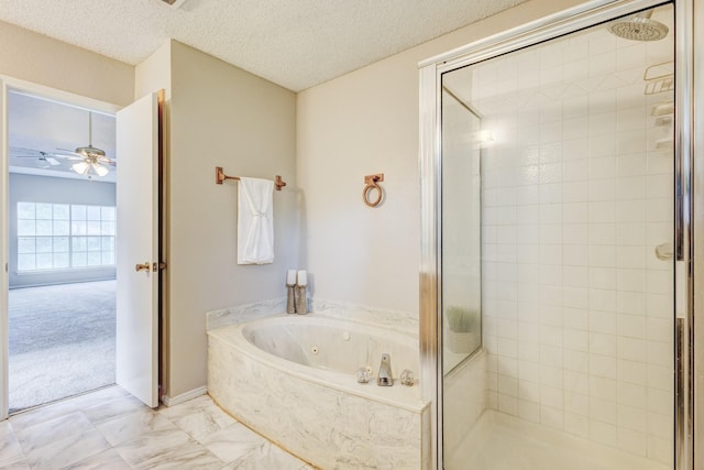 1019 W Lovers Ln W, Arlington, TX 76013 - bathroom featuring a shower stall, a whirlpool tub, marble finish flooring, a ceiling fan, and a textured ceiling