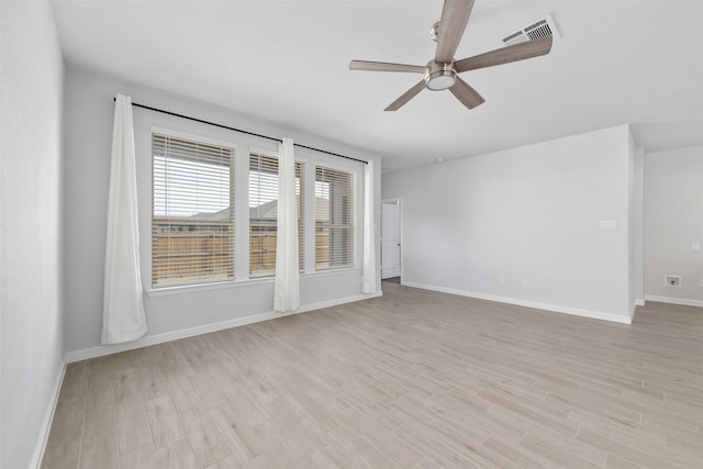 9653 Alderleaf Trl, Fort Worth, TX 76036 - spare room featuring a ceiling fan, baseboards, and light wood-style flooring