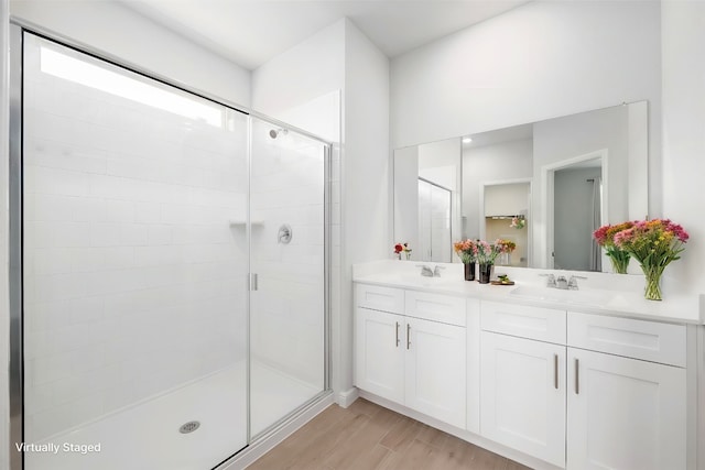 9653 Alderleaf Trl, Fort Worth, TX 76036 - full bath featuring a shower stall, double vanity, and wood finished floors