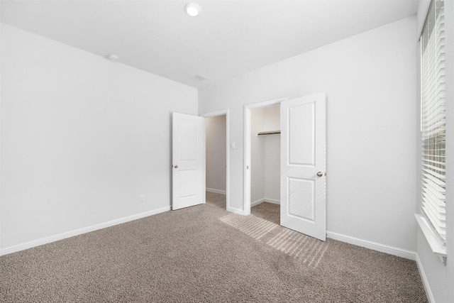 9653 Alderleaf Trl, Fort Worth, TX 76036 - unfurnished bedroom with carpet, multiple windows, and baseboards