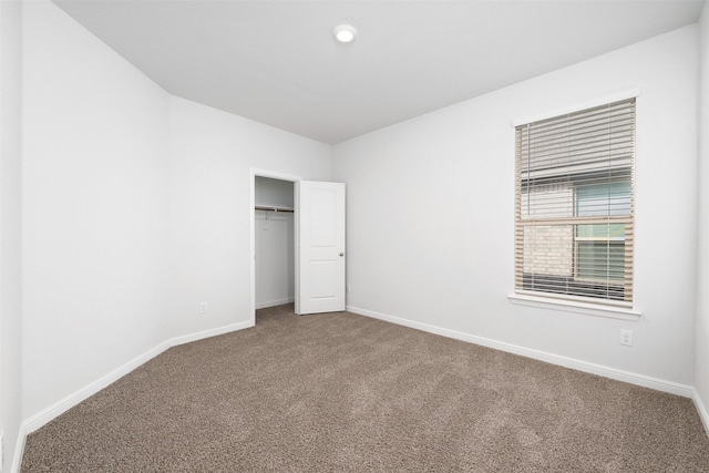 9653 Alderleaf Trl, Fort Worth, TX 76036 - unfurnished bedroom with carpet floors, baseboards, and a closet