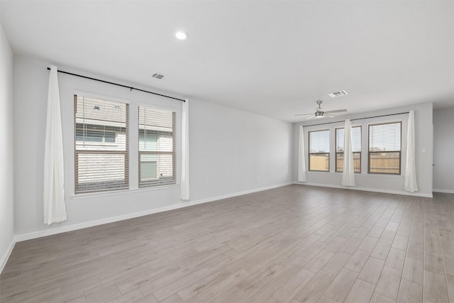 9653 Alderleaf Trl, Fort Worth, TX 76036 - spare room with a ceiling fan, light wood-type flooring, baseboards, and recessed lighting
