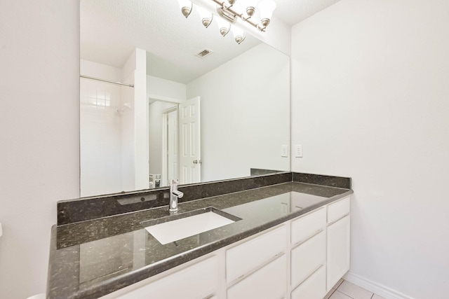 7405 Mesa Verde Trl, Fort Worth, TX 76137 - bathroom with vanity, tile patterned flooring, and baseboards