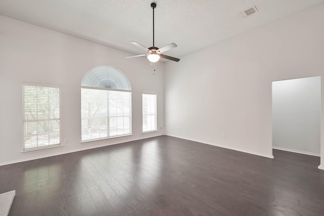 7405 Mesa Verde Trl, Fort Worth, TX 76137 - empty room featuring ceiling fan, dark wood-style floors, and baseboards