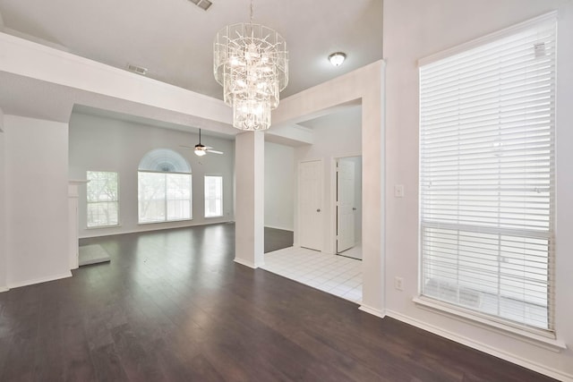7405 Mesa Verde Trl, Fort Worth, TX 76137 - empty room featuring a chandelier, ceiling fan, wood finished floors, and baseboards