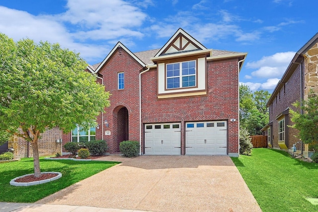 205 Hogue Ln, Wylie, TX 75098 - view of front of property with driveway, an attached garage, a front lawn, and brick siding