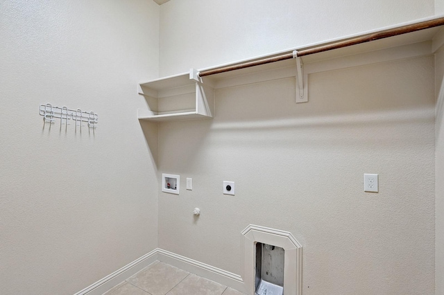 205 Hogue Ln, Wylie, TX 75098 - laundry area featuring electric dryer hookup, gas dryer hookup, hookup for a washing machine, baseboards, and light tile patterned floors