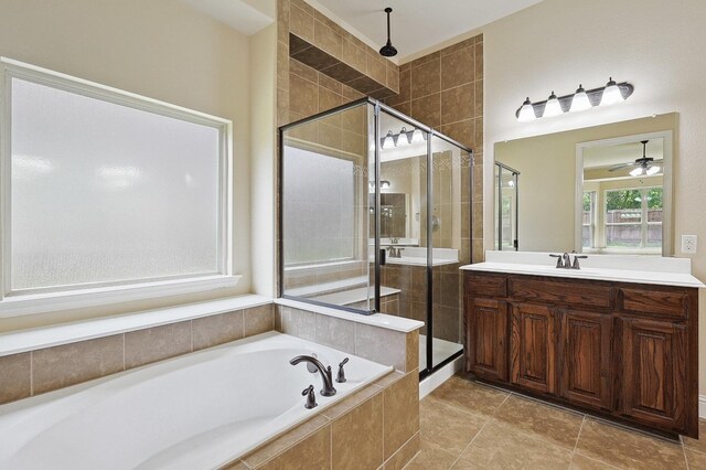 205 Hogue Ln, Wylie, TX 75098 - bathroom featuring a stall shower, a bath, vanity, and ceiling fan