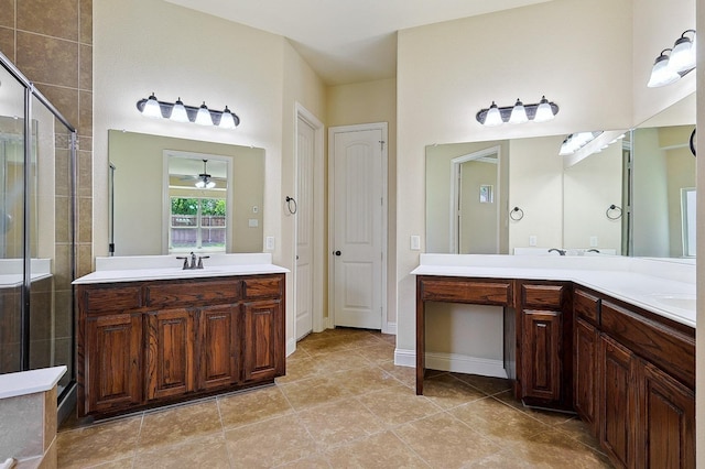 205 Hogue Ln, Wylie, TX 75098 - bathroom with a shower stall, two vanities, tile patterned floors, and baseboards