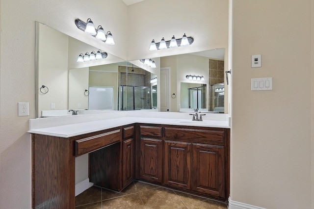 205 Hogue Ln, Wylie, TX 75098 - bathroom featuring double vanity, tile patterned flooring, and a shower stall