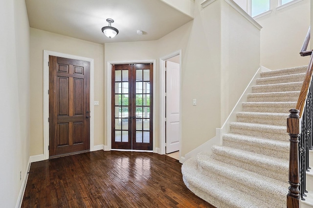 205 Hogue Ln, Wylie, TX 75098 - foyer featuring french doors, wood finished floors, and stairway