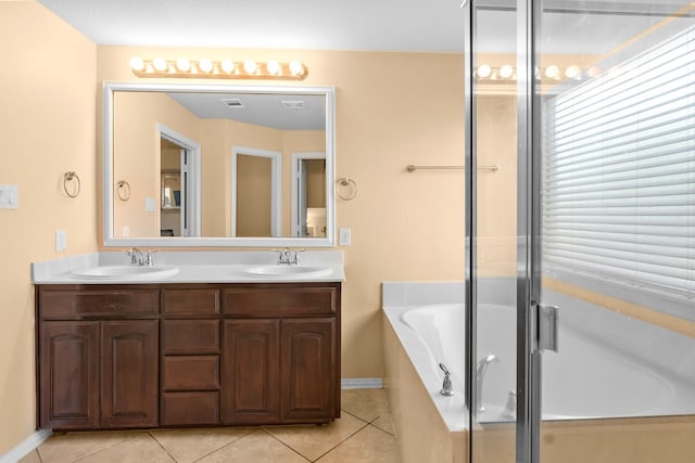 12001 Walden Wood Dr, Fort Worth, TX 76244 - full bathroom featuring double vanity, tile patterned floors, a bath, baseboards, and a shower with shower door