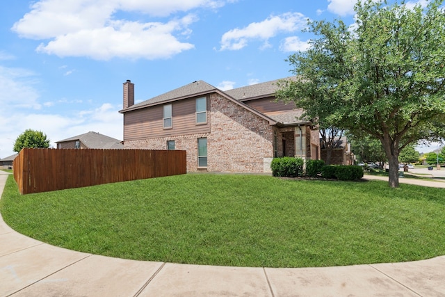 12001 Walden Wood Dr, Fort Worth, TX 76244 - view of home's exterior with brick siding, a chimney, and a shingled roof