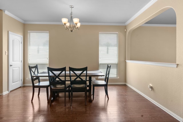 12001 Walden Wood Dr, Fort Worth, TX 76244 - dining area featuring a chandelier, plenty of natural light, dark wood-type flooring, and ornamental molding