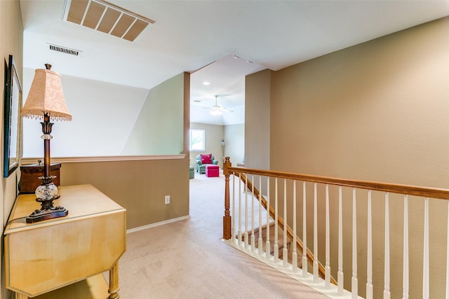 3801 Emerald Park Dr, Corinth, TX 76208 - hallway with an upstairs landing, carpet floors, and baseboards