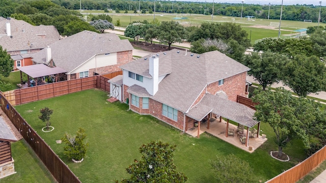 3801 Emerald Park Dr, Corinth, TX 76208 - view from above of property featuring a tree filled landscape