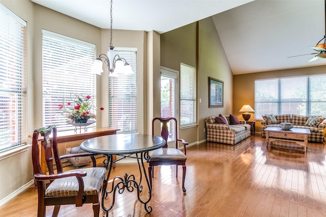 3801 Emerald Park Dr, Corinth, TX 76208 - dining room featuring light wood-type flooring, plenty of natural light, baseboards, and vaulted ceiling
