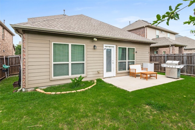 10313 Dimmit Pl, Mckinney, TX 75071 - back of property with a patio and a shingled roof