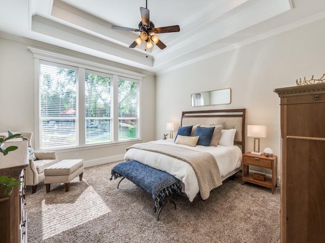 1221 Morris Dr, Keller, TX 76248 - carpeted bedroom featuring ornamental molding, a raised ceiling, a ceiling fan, and baseboards