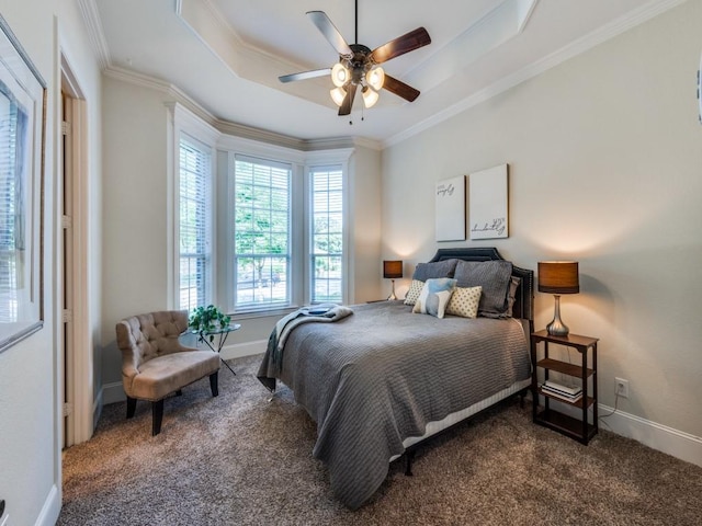 1221 Morris Dr, Keller, TX 76248 - carpeted bedroom featuring a raised ceiling, baseboards, crown molding, and a ceiling fan