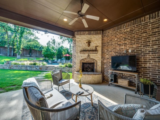 1221 Morris Dr, Keller, TX 76248 - view of patio / terrace with a ceiling fan and an outdoor living space with a fireplace