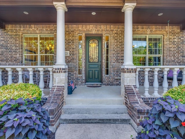 1221 Morris Dr, Keller, TX 76248 - doorway to property with a porch and brick siding