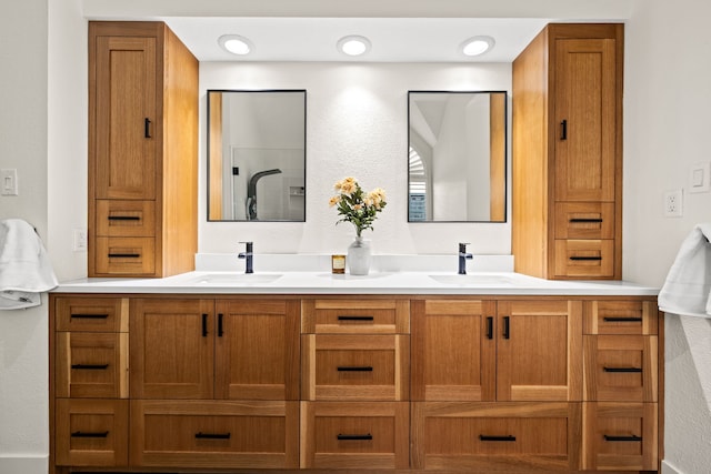 2600 Shadow Hill Ln, Plano, TX 75093 - bathroom with double vanity and a textured wall