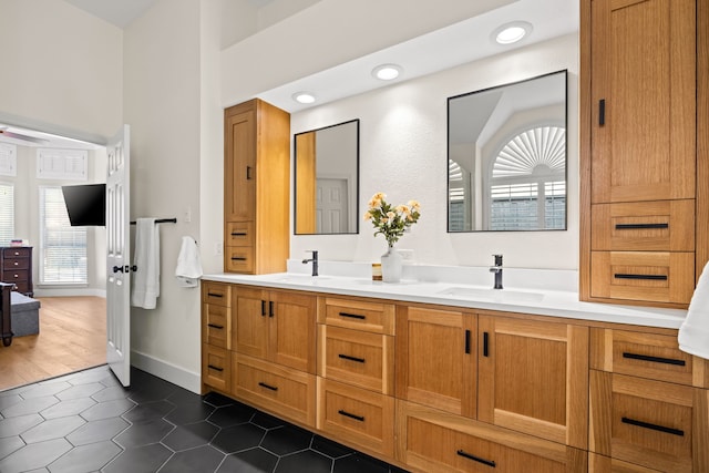 2600 Shadow Hill Ln, Plano, TX 75093 - full bathroom with tile patterned floors, plenty of natural light, and double vanity