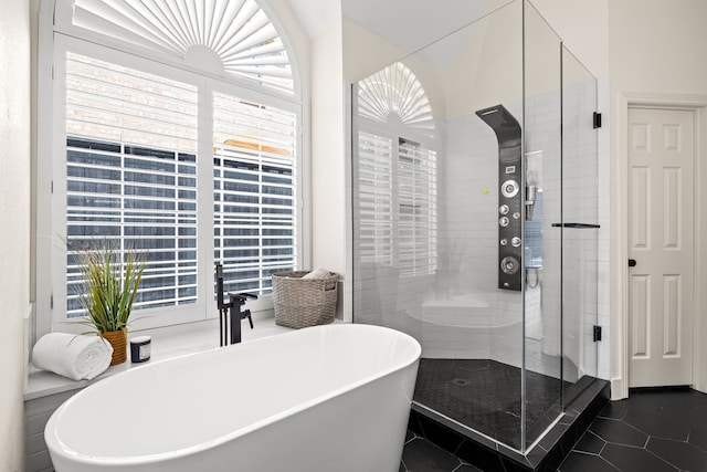 2600 Shadow Hill Ln, Plano, TX 75093 - bathroom featuring a freestanding bath, a shower stall, and tile patterned floors